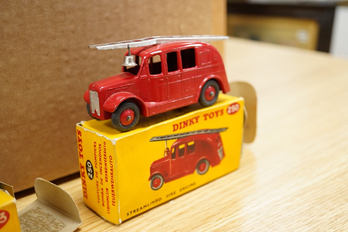 Eight boxed Dinky Toys; Royal Mail van (260), Leyland Atlantean bus (292), Atlas Copco Compressor Lorry (436), Standard Atlas Kenebrake (295), BOAC coach (283), Streamlined Fire Engine (250), Field Artillery Tractor (688